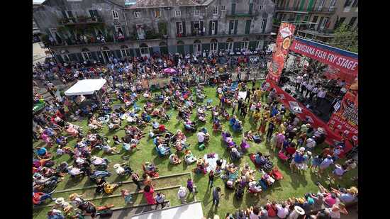 People enjoying a performance in the grounds of the museum (New Orleans Jazz Museum)